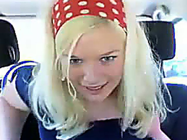 Blue-eyed blonde fingering her butthole in the backseat