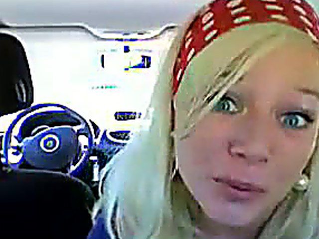 Blue-eyed blonde fingering her butthole in the backseat