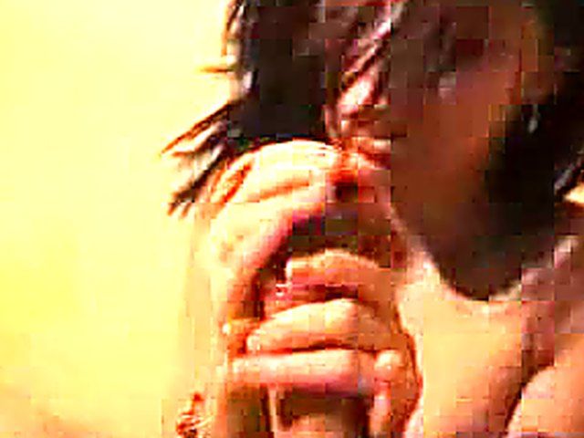 Brunette gives double handed handjob to her boyfriend