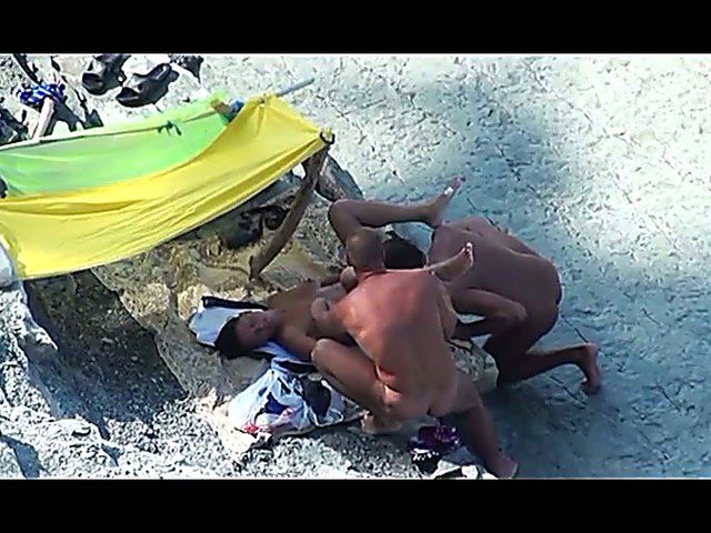 Slutty brunette gets tag teamed outdoors in public place