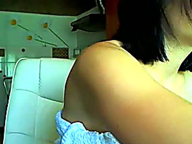Glassed brunette dildoing her snatch in the kitchen