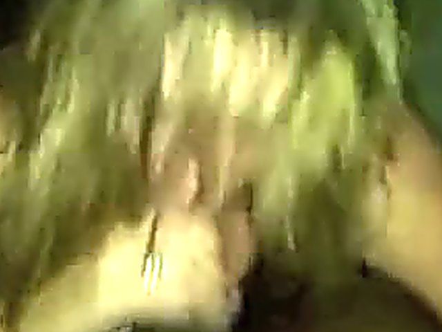 Mature blonde sucks on a big black cock