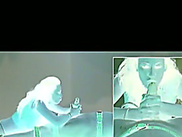 Long haired brunette in thong jerks guy off