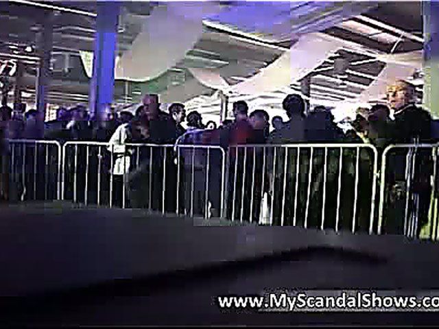 Stripper fucks herself in public with a dildo