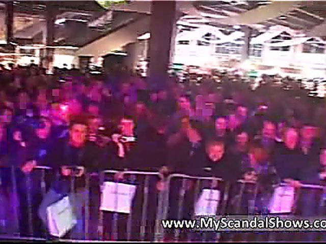 Stripper fucks herself in public with a dildo