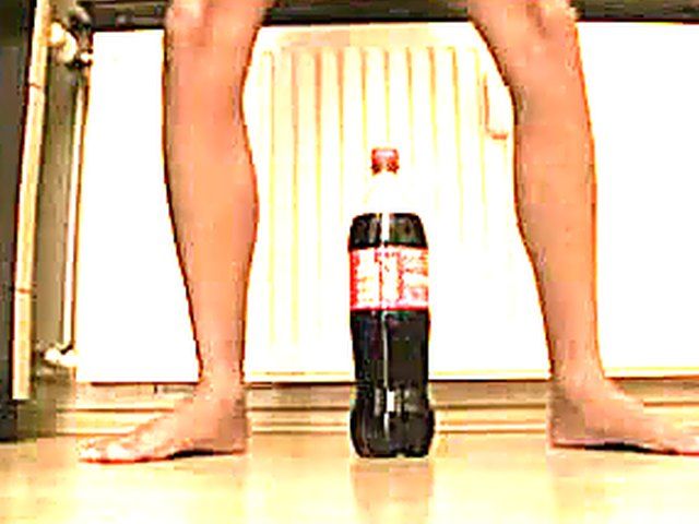 Amazing chick shoves a bottle up her pussy