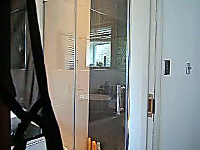 Wonderful MILF rubs her pussy after a shower