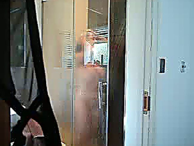 Wonderful MILF rubs her pussy after a shower