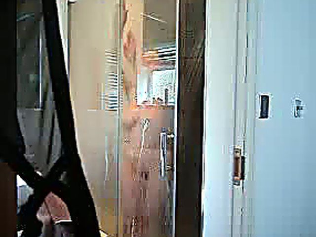 Wonderful MILF rubs her pussy after a shower