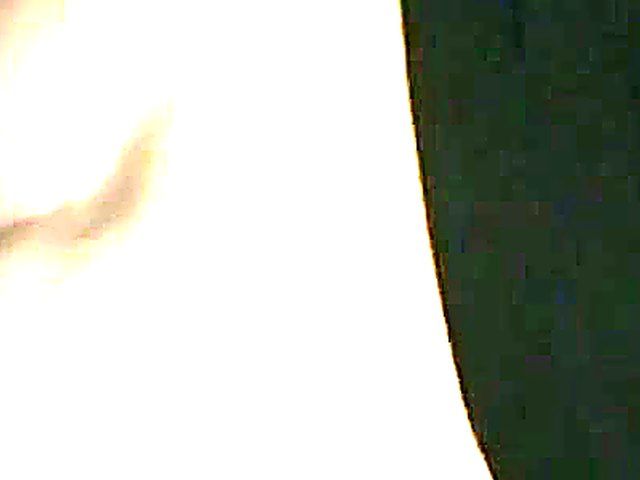 Mature woman sucks cock through a glory hole