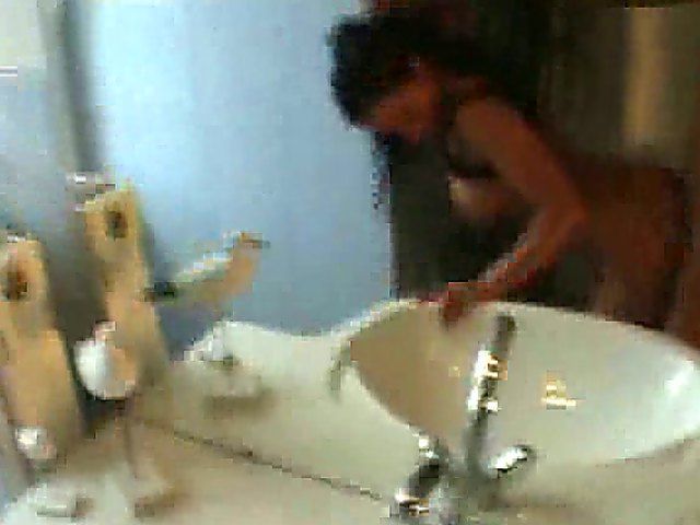 Sexy chick fucks in front of the mirror