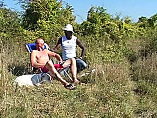 Beautiful brunette gets fucked by two cocks outside