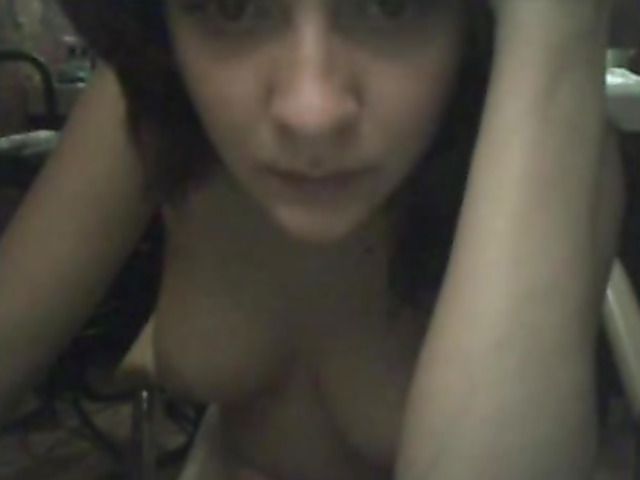 Topless amateur exposes her sexy tits on webcam