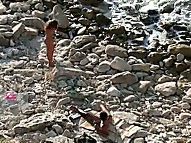 Horny couple have sex outdoors on the beach