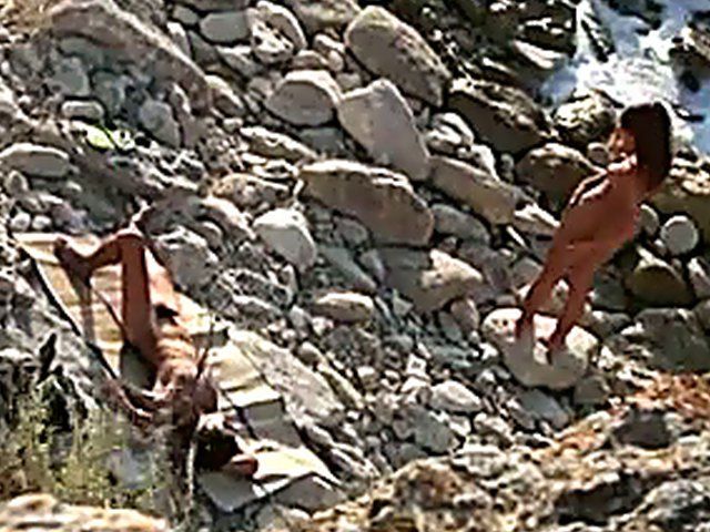 Horny couple have sex outdoors on the beach
