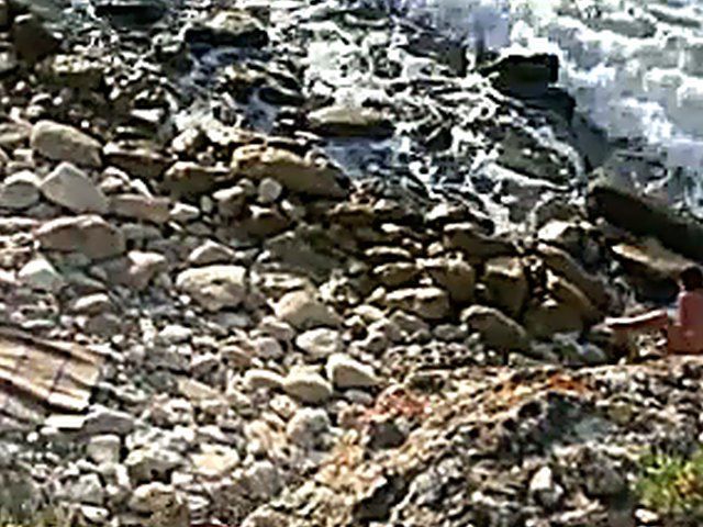 Horny couple have sex outdoors on the beach