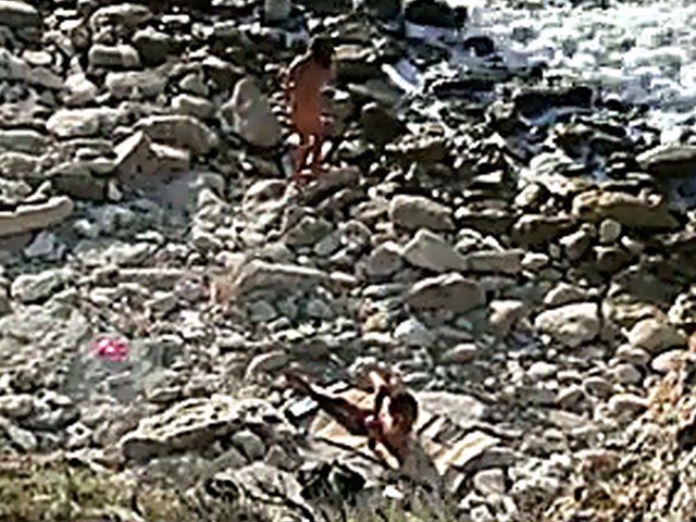 Horny couple have sex outdoors on the beach