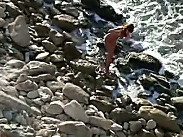 Horny couple have sex outdoors on the beach