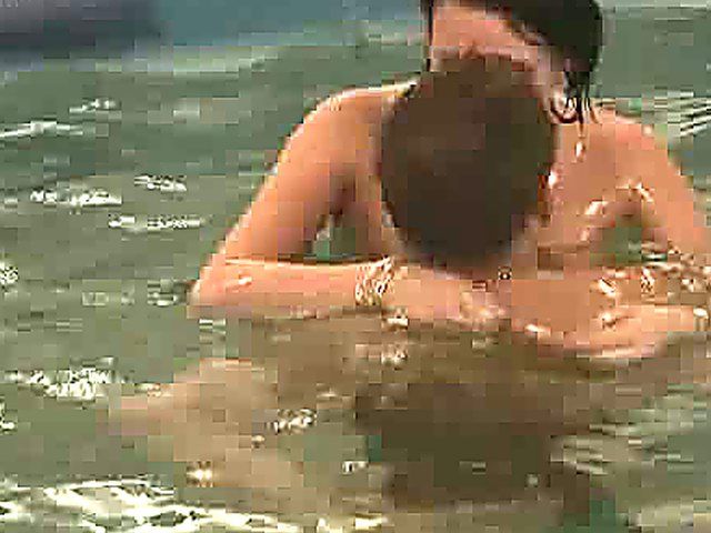 Swinging horny babes get fucked by the pool