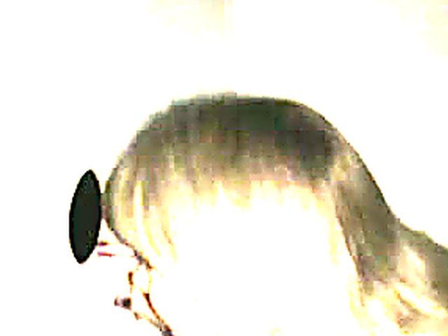 Blonde slut sucks black cock in a gloryhole