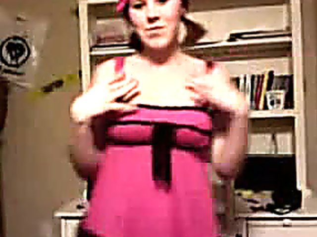 Horny redhead slides a vibrator up her pussy