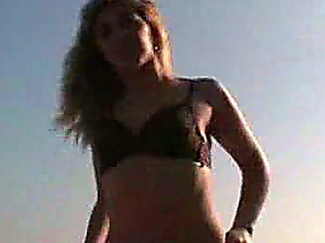 Horny couple film themselves fucking on a beach