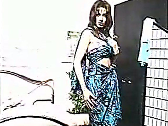 Horny babe fingers her tight hairy pussy