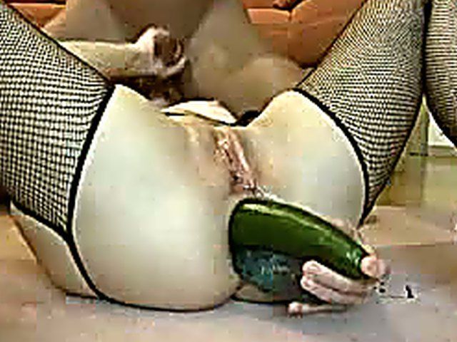 Ugly wife gets fucked with a cucumber
