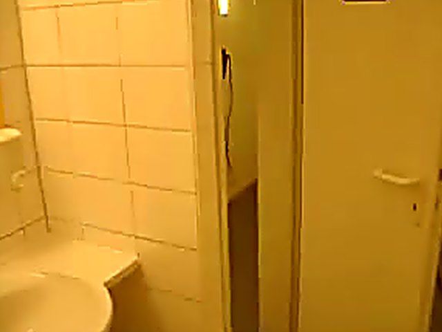 Naughty babe sucks cock in a toilet