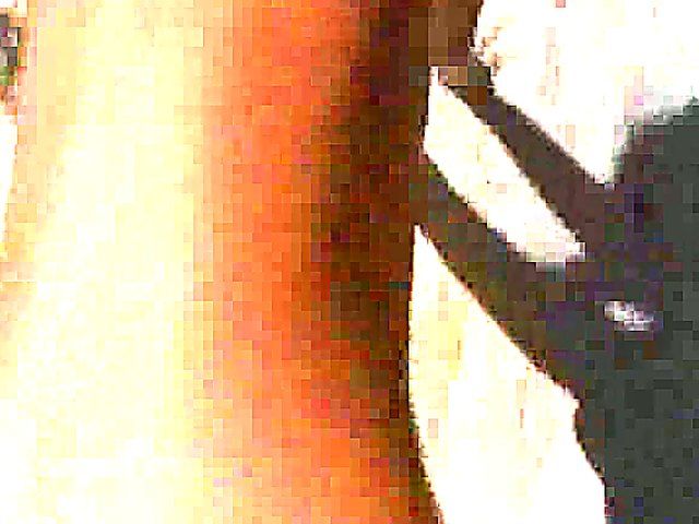 Tanning MILF on beach is exhibitionist