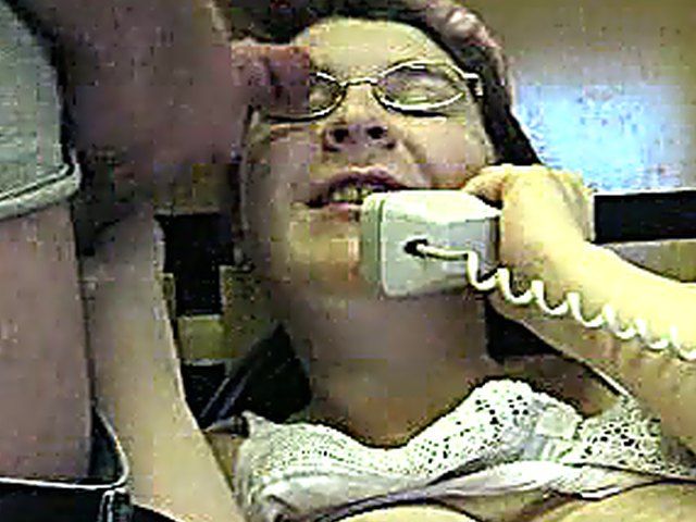 A MILF takes a call and a load 