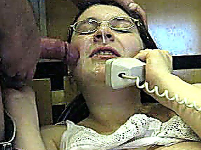 A MILF takes a call and a load 