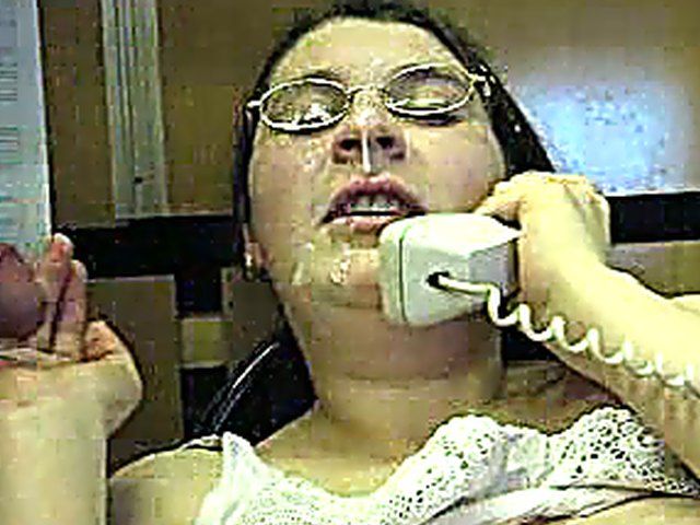A MILF takes a call and a load 