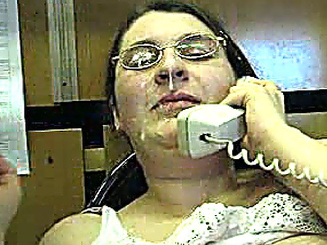 A MILF takes a call and a load 