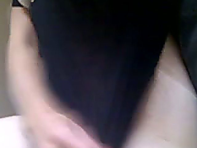 Horny babe fingers and rubs her hairy pussy