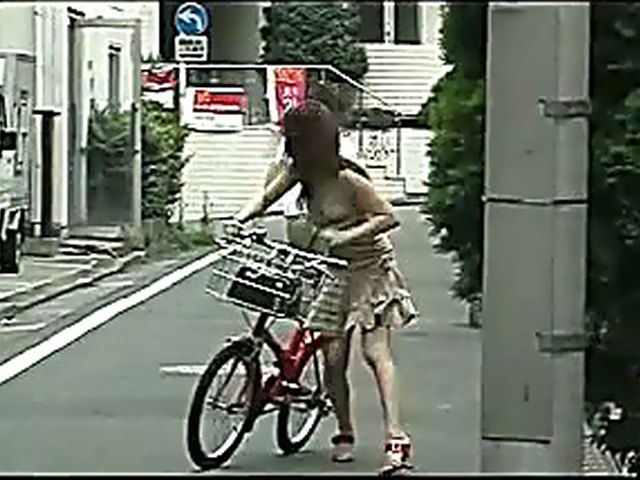 Hidden cam films girls tits in the street