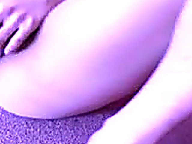 Sensual Japanese babe strips and fingers her pussy