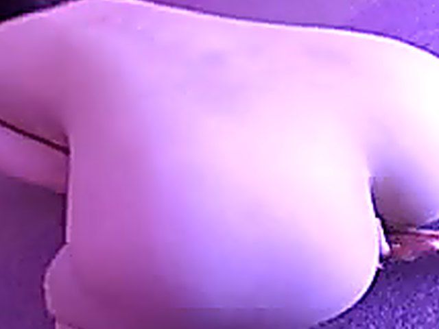 Sensual Japanese babe strips and fingers her pussy