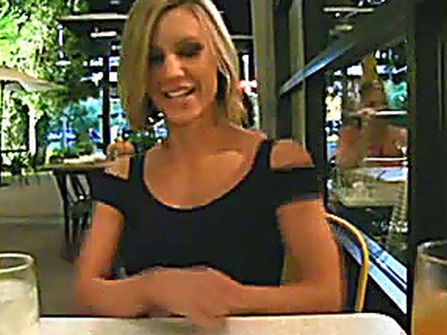 A classy chick flashes her body in public