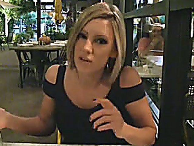 A classy chick flashes her body in public