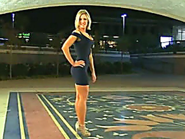 A classy chick flashes her body in public