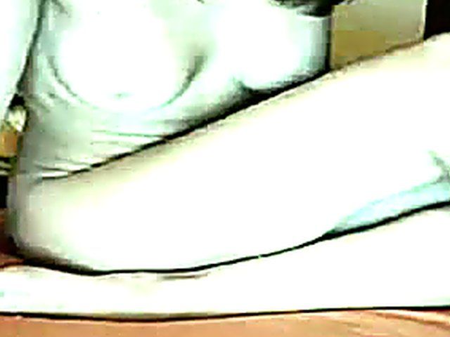 A gorgeous girl spreads her legs and masturbates