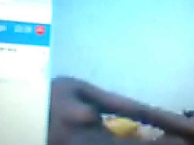 Black babe fucks her pussy on the web