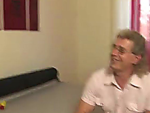 A German woman uses a dildo after sex