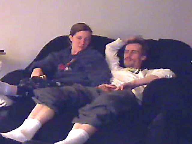 A good looking housewife jerks her husbands cock