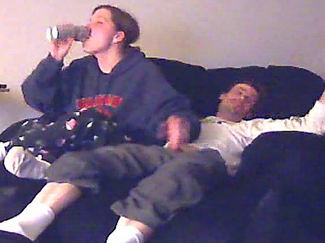 A good looking housewife jerks her husbands cock