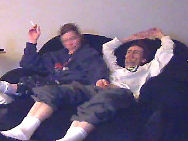 A good looking housewife jerks her husbands cock