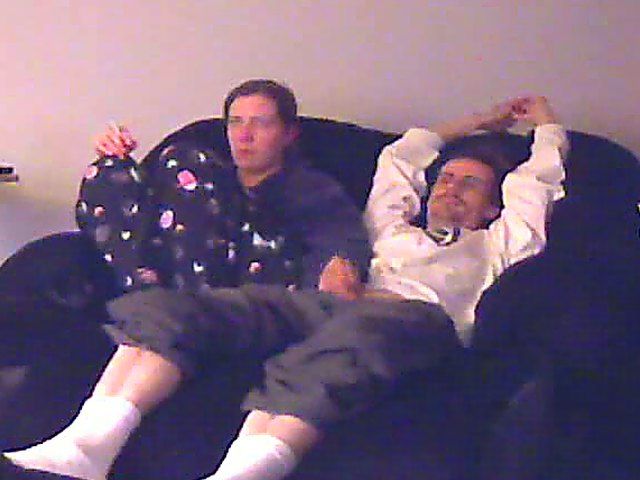 A good looking housewife jerks her husbands cock