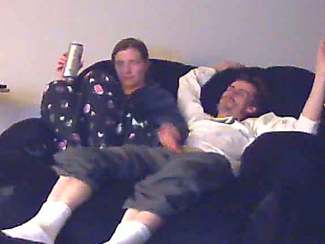 A good looking housewife jerks her husbands cock