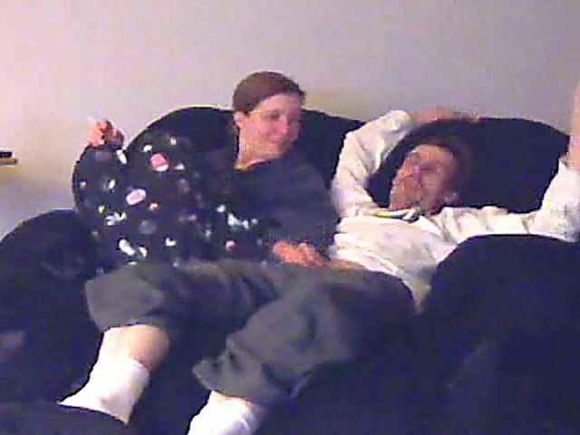 A good looking housewife jerks her husbands cock